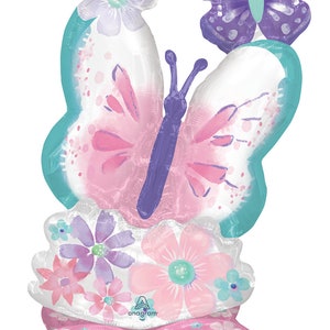 May include: A pink and purple butterfly balloon with a floral design. The balloon is made of mylar and has a self-sealing valve. The balloon is decorated with flowers and butterflies. The balloon is made by Anagram.