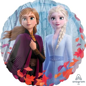 May include: A round, silver foil balloon featuring Elsa and Anna from Disney's Frozen II. The balloon has a blue and purple background with red and orange leaves. The text "Anagram" is in the bottom right corner.