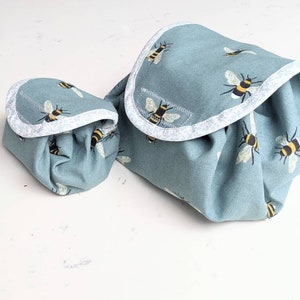 Lay flat makeup/skin care bag (Standard & Handbag Sizes) - Sophie Allport Bee fabric Blue