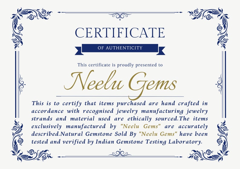 May include: A certificate of authenticity for Neelu Gems. The certificate states that the items purchased are hand-crafted in accordance with recognized jewelry manufacturing standards and that the materials used are ethically sourced. The items are exclusively manufactured by Neelu Gems and have been tested and verified by the Indian Gemstone Testing Laboratory.
