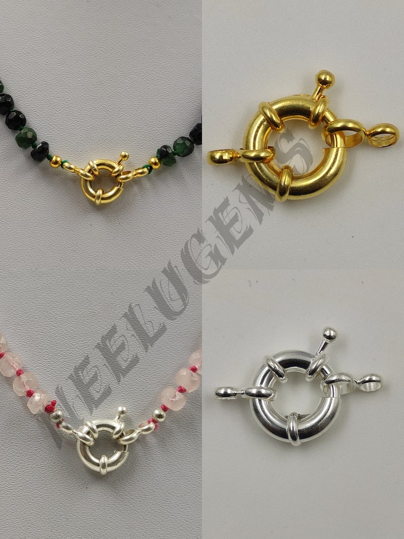 May include: Two different types of clasps for necklaces. The top clasp is gold and the bottom clasp is silver.