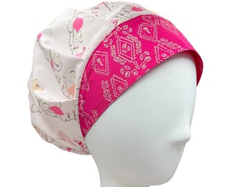 May include: A pink and white surgical scrub hat with a pink bandana print on the back. The hat is made of soft, breathable fabric and is designed to be comfortable to wear for long hours.