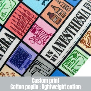 May include: Close-up of a custom print fabric featuring medical equipment and drug illustrations in a grid pattern. The text "IN MY ANESTHESIA" is visible. The fabric is made of lightweight cotton.