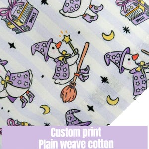 May include: White fabric with a repeating pattern of cartoon geese dressed as witches, holding wands and brooms. The geese wear purple hats and robes with star accents. The background has light purple stripes, moons, and stars. The text "Custom print Plain weave cotton" is at the bottom.