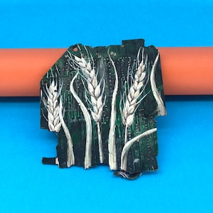 Painting on a piece of an element of a Russian rocket. Handmade.