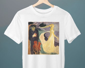 May include: White t-shirt featuring a colourful painting of a man and a woman standing in a landscape. The woman is wearing a yellow dress and has long flowing hair. The man is wearing a dark blue jacket and has his hands clasped in front of him.