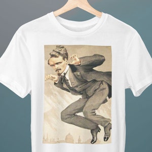 May include: White t-shirt with a vintage illustration of a man in a suit jumping in the air. The illustration is in shades of brown and white and features a cityscape in the background.