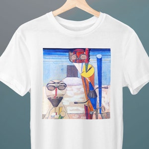 May include: White t-shirt with a colorful abstract painting of geometric shapes and figures. The painting features a blue, red, yellow, and white color scheme.