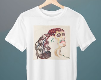 May include: White t-shirt featuring a colourful painting of two faces, one with red hair and the other with brown hair.