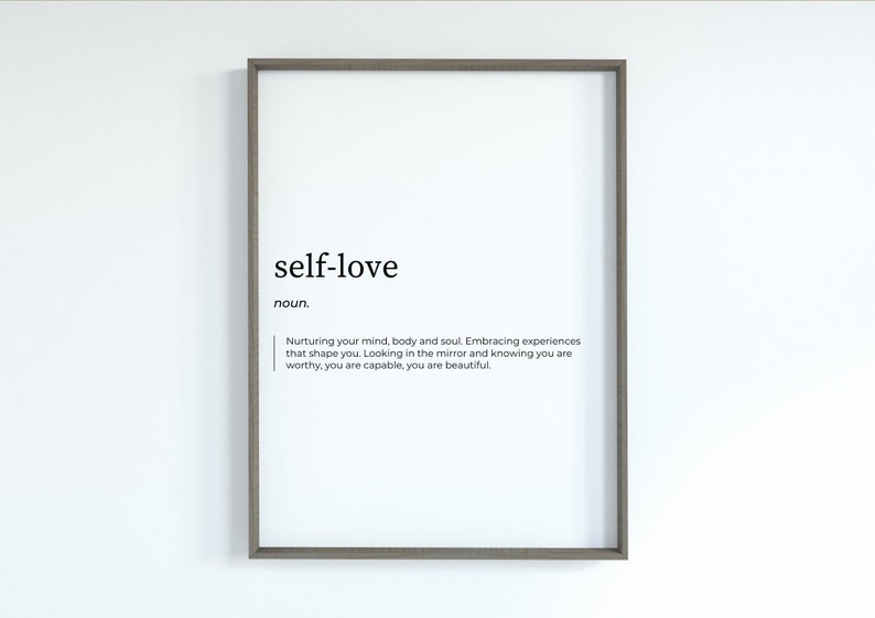 May include: A framed print with the word "self-love" defined as "Nurturing your mind, body and soul. Embracing experiences that shape you. Looking in the mirror and knowing you are worthy, you are capable, you are beautiful."