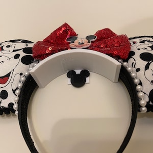 close up of white with black extended mickey ear holder