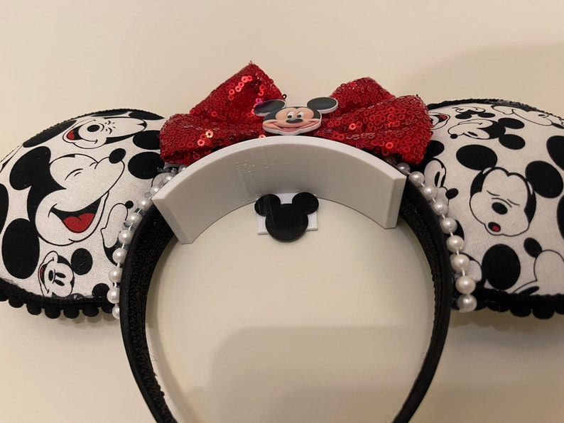close up of white with black extended mickey ear holder