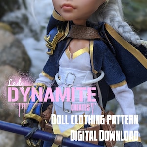 May include: A doll wearing a blue and white outfit with gold accents. The doll is holding a blue and black staff. The text "Lady Dynamite Creates" is visible in the image. The text "Doll Clothing Pattern Digital Download" is also visible in the image.