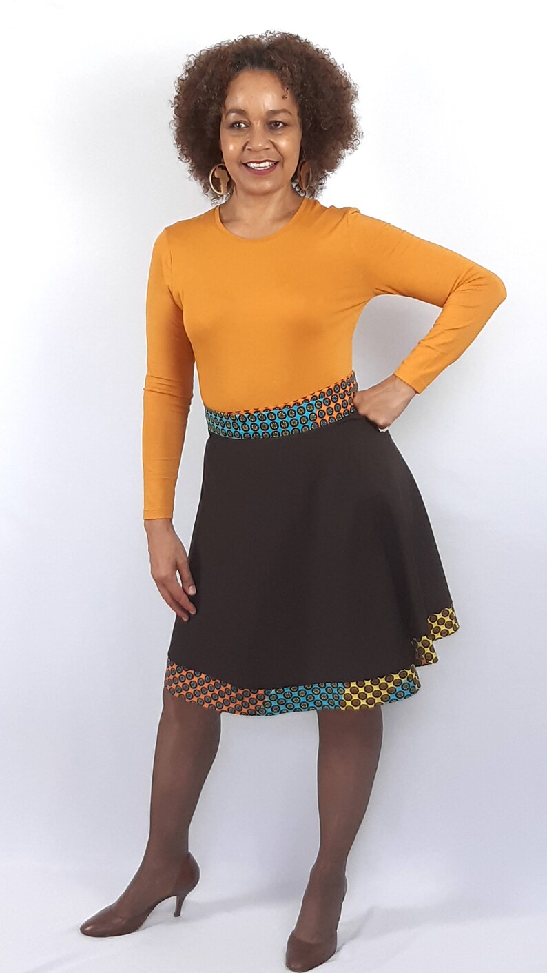 A stunning short length full flare cotton wrap skirt with an ethnic trim