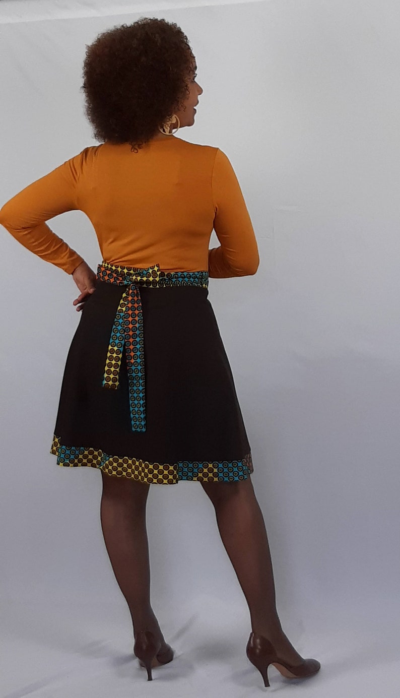 A stunning short length full flare cotton wrap skirt with an ethnic trim