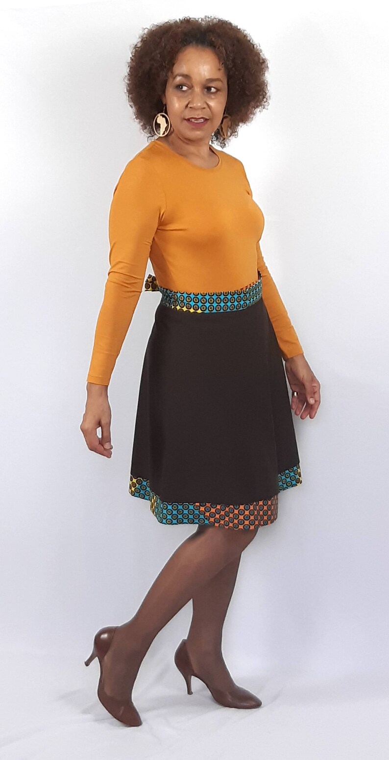 A stunning short length full flare cotton wrap skirt with an ethnic trim