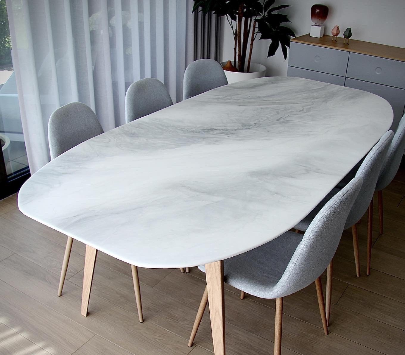 Dwell marble dining table deals