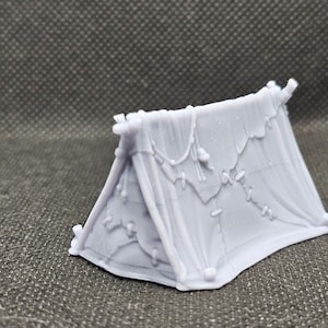 May include: A white, miniature, 3D printed tent with a simple design and a textured surface. The tent has a pointed roof and a flap that can be opened or closed.