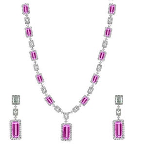 May include: A pink and white diamond necklace and earrings set. The necklace features a pendant with a large pink rectangular stone surrounded by smaller diamonds. The earrings are drop earrings with a pink rectangular stone and smaller diamonds.