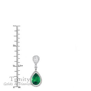 May include: A pear-shaped emerald gemstone earring with a halo of smaller diamonds. The earring is suspended from a smaller pear-shaped diamond with a halo of smaller diamonds. The earring is approximately 2.5 cm long.