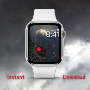 May include: A white Apple Watch with a black and white watch face featuring a cartoon monster with red eyes and the time 8:41. The watch face also shows the date, Wed 11.