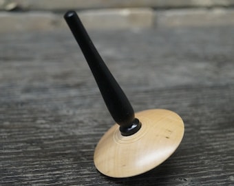 spinning top made of ebony and maple