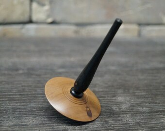 spinning top made of ebony and pear wood