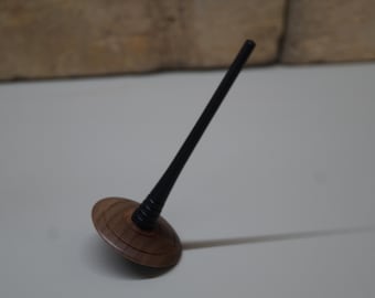 spinning top made of ebony and walnut