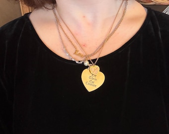 Vintage dual tone Juicy couture “let them eat couture” multi strand charm necklace.