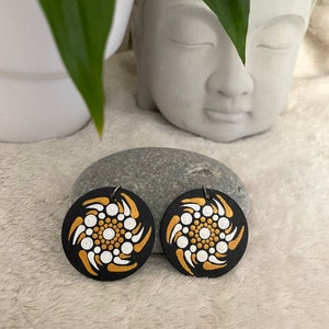 Golden Eclipse – Hand-painted wooden earrings, solar pointillism & hidden message
