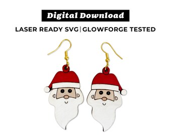 May include: A pair of red and white Santa Claus face earrings with gold hooks.  The earrings are laser cut and ready to be used for crafting.