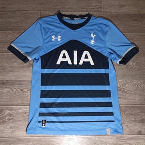 Tottenham Hotspur THFC Spurs Anglia under armour 2015/16 niebieska chłopięca sportowa piłka nożna koszulka piłkarska odzież młodzieżowa nastoletnia L 12-14 lat
