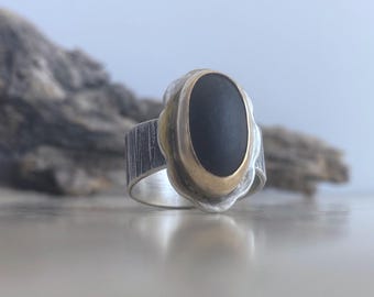 Handcrafted Mixed Metal Ring with Black Stone: patterned sterling silver, 14K gold-filled bezel