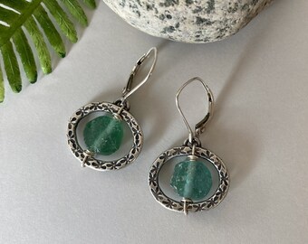 Handcrafted Earrings: ancient Roman glass beads encircled by a halo of stamped sterling silver