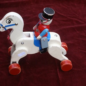 Vintage Dutch wooden horse pull toy