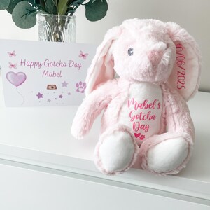 Personalised dog gotcha day plush toy in pink bunny design with dog's name and gotcha day date, new puppy gift.