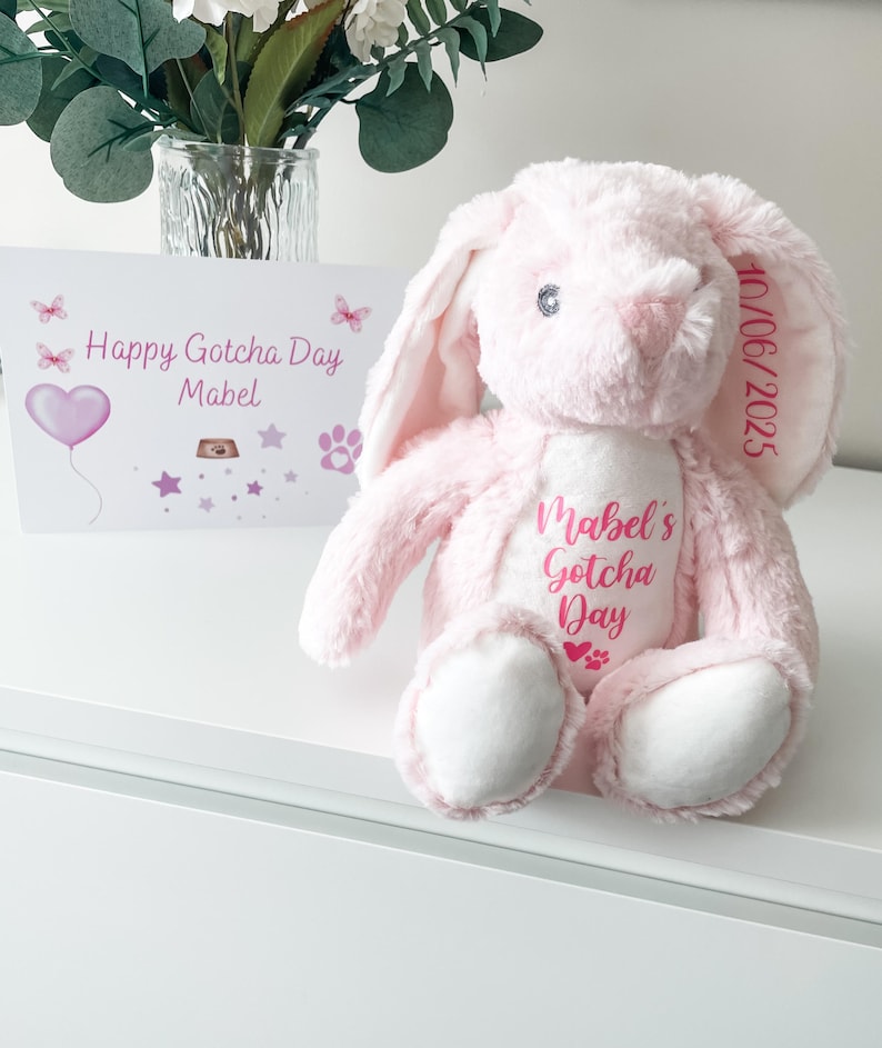 Personalised dog gotcha day plush toy in pink bunny design with dog's name and gotcha day date, new puppy gift.