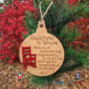 May include: A wooden Christmas ornament with a red rocking chair and the text "Christmas in Heaven. What do they do? They come down to Earth To spend time with You! So, save them a seat, Just one empty chair. You may not see them but They will be There!"