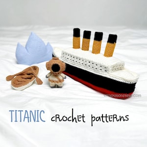 May include: A collection of crochet items themed around the Titanic, featuring a ship, diver, life raft, and an iceberg. The ship is white, black, and red, with four yellow and black funnels. Text reads "Titanic crochet patterns".