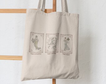 May include: A beige tote bag with three illustrations of people in frames. The frames are labeled "The Lunatic", "The Lover", and "The Poet".
