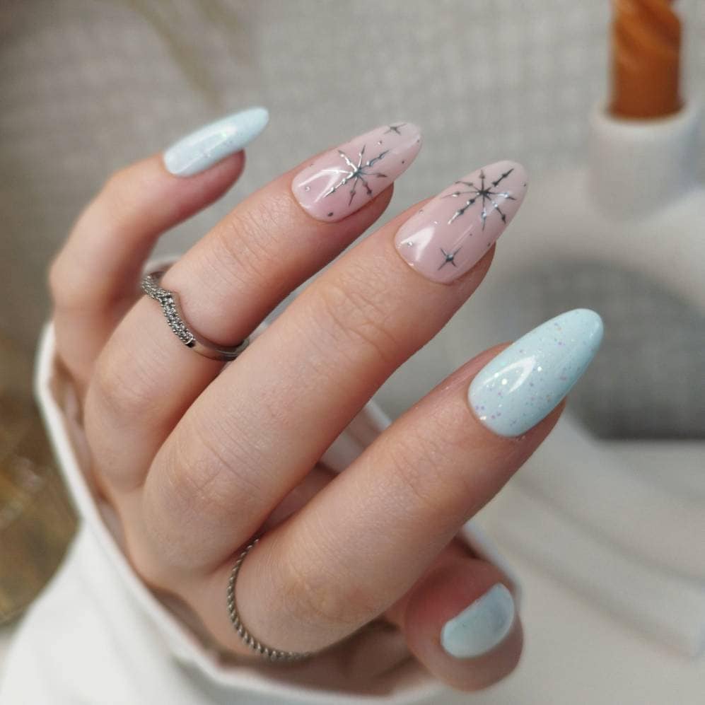 Snowflake Crystal Embossed Nails for a Winter Glow