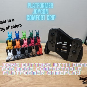 Może przedstawiać: 3D-wydrukowany uchwyt Joycon zapewniający komfort użytkowania dla Nintendo Switch. Uchwyt został zaprojektowany tak, aby przyciski były wyrównane z krzyżakiem, co zapewnia bardziej komfortową rozgrywkę w gry platformowe. Dostępny w różnych kolorach. Joycon nie jest wliczony w cenę.