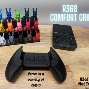 May include: Black R36S Comfort Grip for a handheld gaming device. The grip has a textured surface and comes in a variety of colors. R36S Device Not Included.
