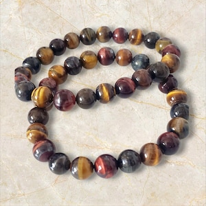 Multi-Colored Tiger’s Eye Bracelet | Protection & Grounding Crystal | 8mm–12mm Natural Beads
