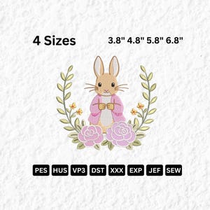 Puede incluir: Diseño bordado de un conejito con abrigo rosa, rodeado por una corona floral. Disponible en cuatro tamaños: 9,65 cm, 12,19 cm, 14,73 cm y 17,27 cm. La imagen también muestra varios formatos de archivo de bordado.