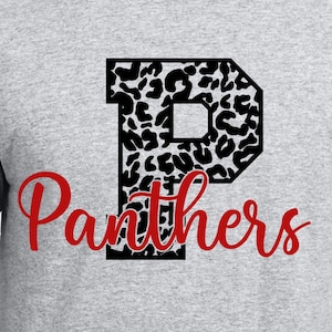 May include: A gray t-shirt with a black letter "P" with a leopard print design. The word "Panthers" is written in red below the letter.