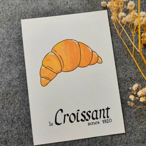 Carte postale : Baguette | Croissant | Chocolatine | Croissant | Crêpe | Macaron | Café | Chouquette | Croque-Monsieur Croissant