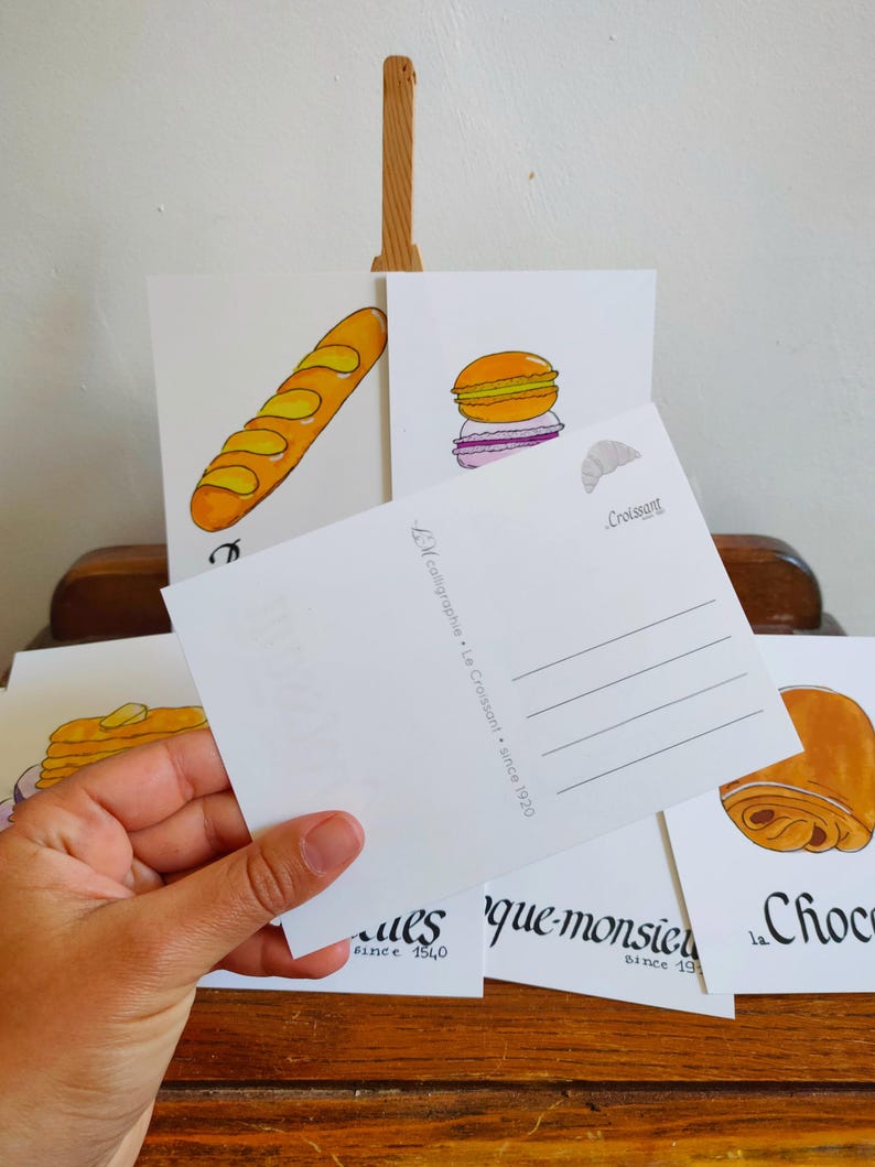 Carte postale : Baguette | Croissant | Chocolatine | Croissant | Crêpe | Macaron | Café | Chouquette | Croque-Monsieur image 2