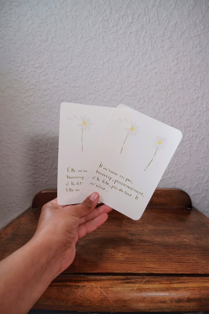 Carte "Il m'aime, un peu, beaucoup, ..." image 1