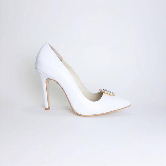 all white stilettos